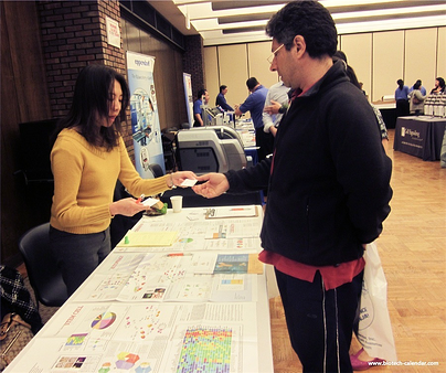 A researcher from the 2015 BioResearch Product Faire™ event in Chicago learns about new products available for his lab.