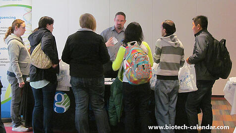 A lab supplier discusses his products with eager and interested WSU researchers at the 2014 event.