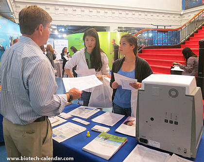 Scientists explain their research to lab product suppliers.