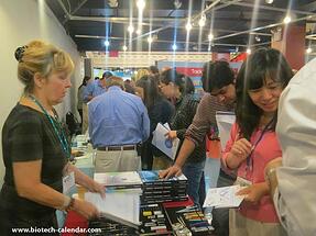 A lab supplier shares information with life scientists at a past BioResearch Product Faire™ Event at the Armory Track & Field Center in New York. 