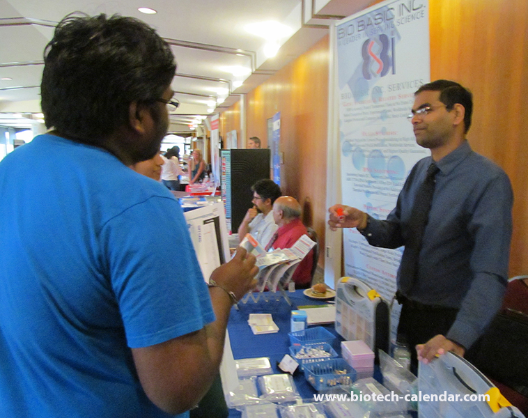 A lab supplier explains his products to a Columbus area researcher at the 2014 BioResearch Product Faire™ Event. 