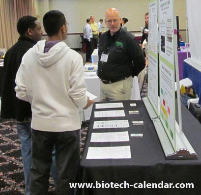 Exhibitors explain their life science products to Thomas Jefferson University researchers.