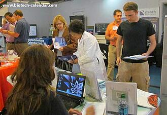 Researchers explore lab product options at a past BioResearch Product Faire™ Event. 