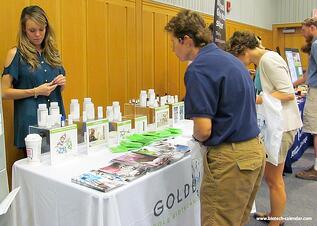 A lab supplier displays products to interested researchers at a past Biotechnology Calendar, Inc. event in Michigan.