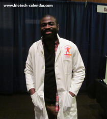 This researcher is all smiles after receiving a new Science Ninja lab coat. 