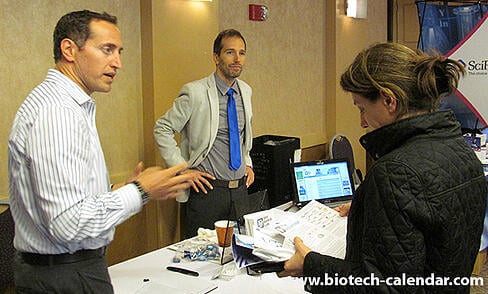 Laboratory equipment suppliers demonstrate their products to Harvard life science researchers.