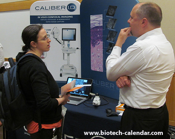 University researchers talk with exhbitors about their laboratory research.