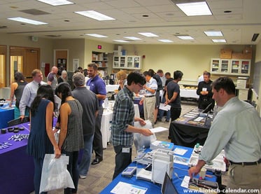 Researchers viewing new lab products at last year's trade fair