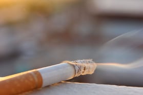 Smoking, one of the causes of small-cell lung cancer. 